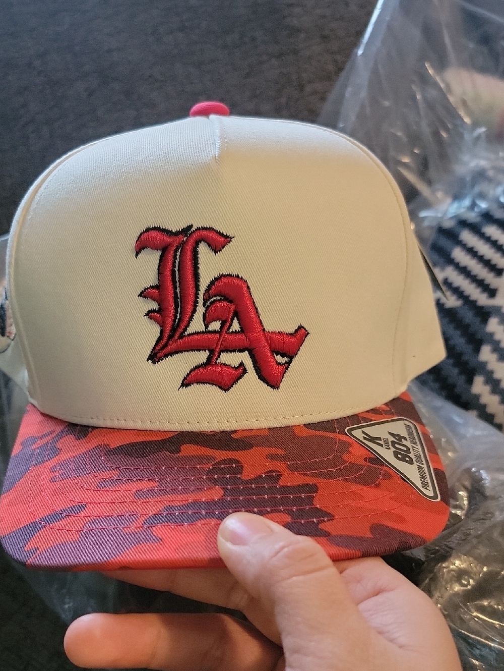LA Embroidered Snapback Hat in Cream and Red